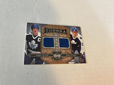 2006-07 ARTIFACTS DARRYL SITTLER (JERSEY # 27) SALMING DUAL JERSEY 27/125 LEAFS