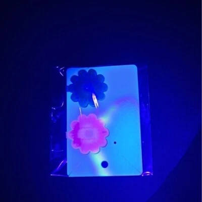 Vintage Barrette Large Pink and Purple Daisies 1970s NEW Blacklight Glow Set - Image 1 of 3