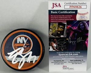 TRAVIS ZAJAC SIGNED NEW YORK ISLANDERS REVERSE RETRO PUCK +JSA COA - Picture 1 of 2