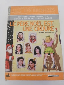 LE PERE NOEL EST UNE ORDURE DVD 2 Disc Limited Collectors edition & 80 Page Book - Bild 1 von 8