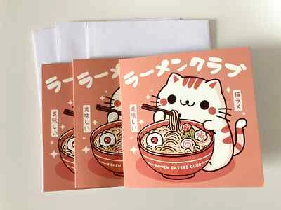 Tarjeta de felicitación lindo gatito blanco rojo ramen comiendo gato Kawaii estilo japonés Foto 1 de 2