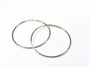 Pendiente aro sin fin de oro amarillo de 14K 27 mm - Imagen 1 de 1