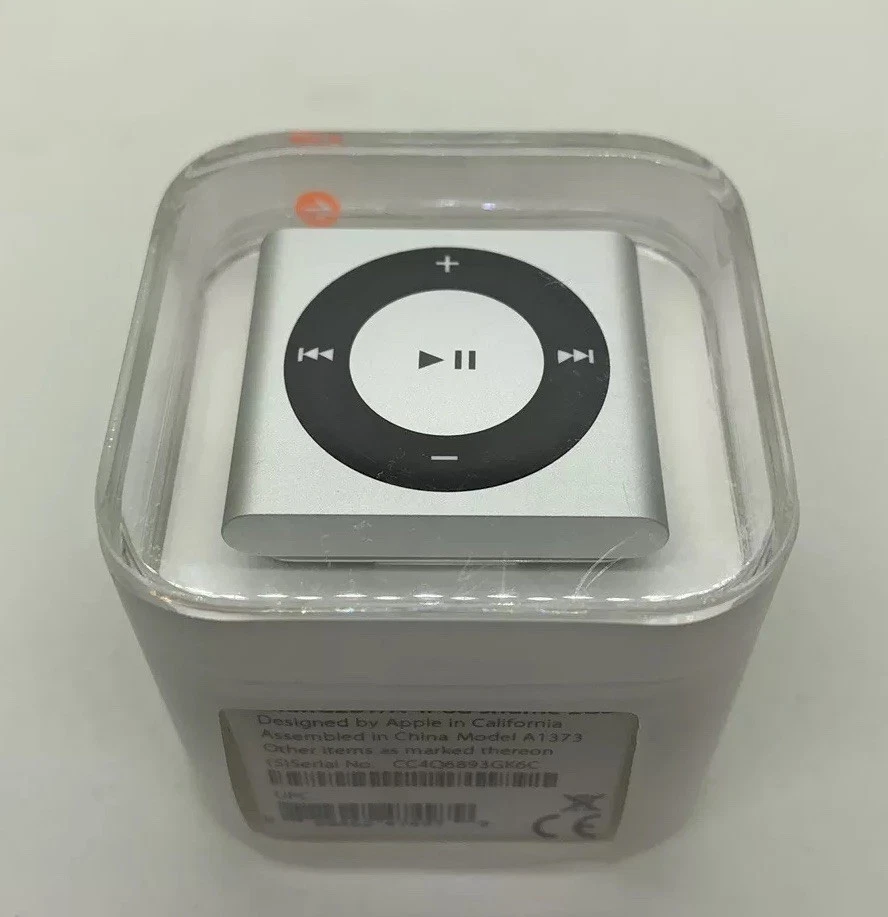 Apple Ipod Shuffle - 4. Generazione Argento 2 GB NUOVO Sigillato - Immagine 1 di 4