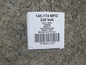 CONDENSADOR DE ARRANQUE DURO REDONDO PACKARD NUEVO EN CAJA 145-174 MFD 330 VOLTIOS PRMJ145 - Imagen 1 de 3