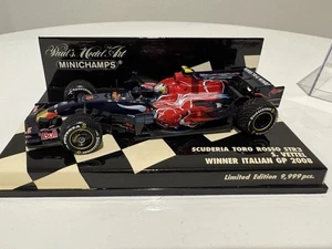 Minichamps 1/43 Seb Vettel 2008 Italian GP First Win Toro Rosso - Picture 1 of 6