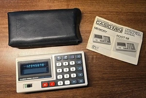 Mini calculadora de memoria Casio vintage con estuche original e instrucciones - Imagen 1 de 6