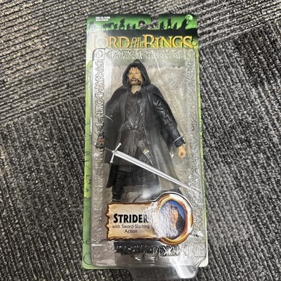 Figura de acción LOTR Fellowship of the Ring Strider con barra de espada Foto 1 de 2