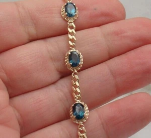 10Ct Oval Cut Simulated Blue Topaz Tennis Bracelet 14K Yellow Gold Plated - Picture 1 of 4