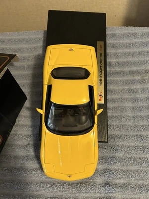 Chevrolet Corvette C6 Z06 2005 arte automático (amarillo) 1/18 Sc. diecast edición limitada sin caja Foto 1 de 4