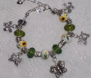 Brazalete de cuentas a mano girasoles, facetas verdes y mariposas estilo euro de Murano - Imagen 1 de 1