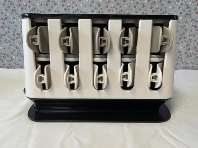 Juego de rodillos calientes tratados con aceite de argán y queratina Remington Shine Therapy (USADOS) Foto 1 de 3