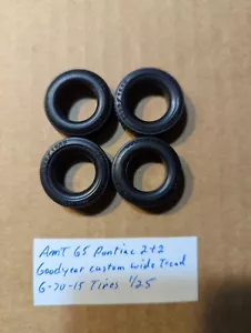 AMT 65 PONTIAC 2+2 GOODYEAR CUSTOM WIDE PROFIL G-70/15 REIFEN SIND NEU UNBENUTZT! 1/25 - Bild 1 von 2