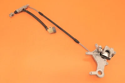 CR250R CR250 1999 97-99 OEM pinza de freno trasera soporte cilindro maestro manguera Foto 1 de 4