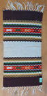 Small vintage hand-woven ethnic runner for a coffee table