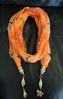 Ladies Bright Orange Scarf With Silver Elephant Shell Detail