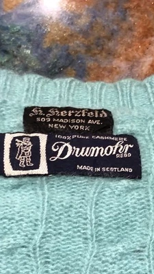 Suéter de cachemir tejido con cable verde azulado liso/aqua Drumohr Foto 1 de 4