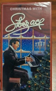 BRAND NEW Christmas With Liberace VHS Amvest 1987 Piano Xmas SEALED - Picture 1 of 2