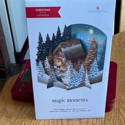 NUEVO American Greetings Magic Moments Navidad Pop Up Tarjeta Cabaña Bosque Foto 1 de 2