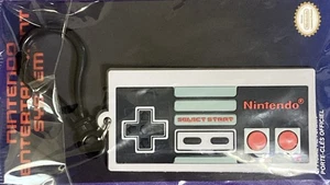 🎮 ATTENTION GAMERS 🎮 NINTENDO REMOTE CONTROL Keyring ✅ NEW 🎁 FREE SHIPPING 2H - Picture 1 of 3