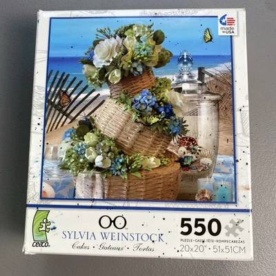 Sensacional Pasteles con Flores Azules 550 Piezas Puzzle - Sylvia Weinstock Completo Foto 1 de 4