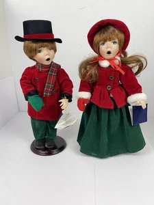 Juego de 2 Muñecas Villancicos de Navidad Cabeza de Porcelana Manos Rojo Verde Terciopelo Trajes - Imagen 1 de 9