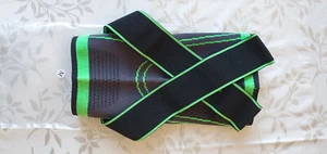 Kniebandage mit Kompressionsstütze Größe M / grün - schwarz - Bild 1 von 3