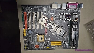 Placa madre MSI MS-7030 VER:1 K8N NEO + Athlon 64 + 768 MB de RAM Foto 1 de 4