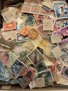 Grab Bag of used 500 World wide Postage Stamps on and off Paper - Picture 1 of 9