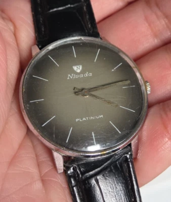 Reloj suizo para hombre Nivada automático 1739M5737 esfera marrón verdoso vintage Foto 1 de 4