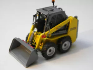 Universal Hobbies Wacker Neusson 701 SP Delta Lader 1/50 - Foto 1 di 8