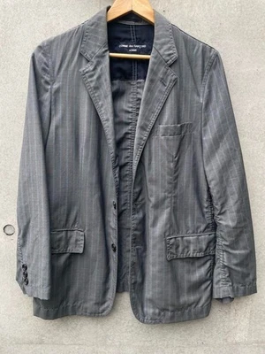 Chaqueta fruncida a rayas Comme des Garçons Homme de Japón Foto 1 de 4