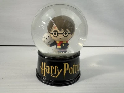 Official harry potter snowglobe (Harry & hedwig) , wizarding world collectible - image 1 of 4