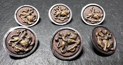 6 ANTIQUE SHANK BUTTONS : GOLDEN CHERUB ON LION, ON WOOD?, SILVER TONE RIM D454 - Image 1 of 4