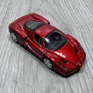 Hot Wheels Enzo Ferrari FAO Nero RED HTF 1:64 Real Riders Loose con supporto - Foto 1 di 16