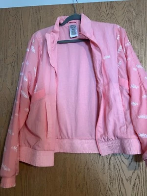 Traje de chándal Adidas rosa para mujer  Foto 1 de 4