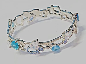 Bracelet/White Gold filled Aquamarine Diamond cut designer bangle 8cms UK/S/ - Picture 1 of 5