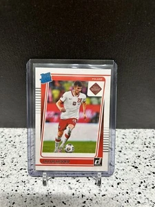 2021-22 Donruss Soccer Road clasificación Qatar novato JAKUB MODER Polonia radiocontrol #179 - Imagen 1 de 2