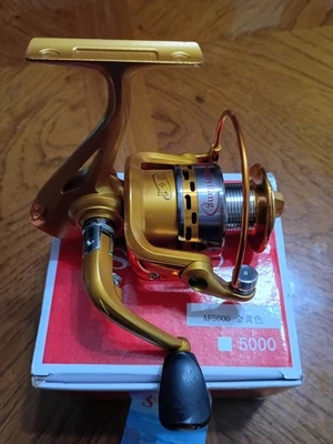 Carrete de pesca giratorio dorado Sougayilang AF5000 NUEVO EN CAJA, leer. Foto 1 de 3