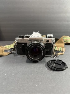 Canon AE-1 Program 35mm Film Camera w/ 50mm f/1.8 FD Lens - Picture 1 of 12