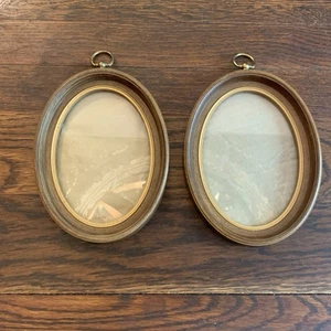 Marcos de fotos superiores de latón de plástico dorado e imitación madera ovalados de colección de 2 piezas para colgar en la pared 5x7 - Imagen 1 de 20