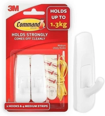 Ganchos utilitarios Command Medianos, blancos, 2 ganchos, 4 tiras, organizan sin daños Foto 1 de 4