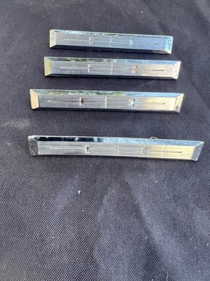 Lincoln Continental 1965 insignias de asiento OEM Foto 1 de 4