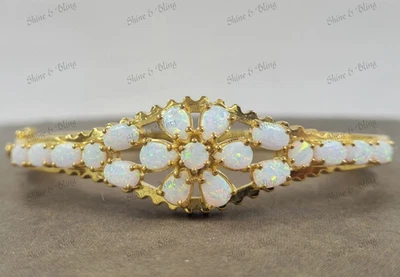 14k Yellow Gold Finish Oval Cut Simulated Fire Opal Fashionable Bangle Bracelet - Image 1 of 4