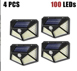 4 X Faretti da Esterno Faretto con Luci LED Pannello Solare SENSORE DI MOVIMENTO - Foto 1 di 7