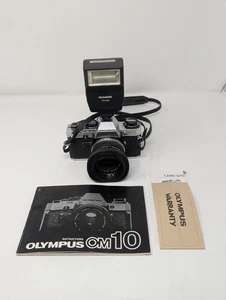 Olympus OM-10 analoge Kompakt-Spiegelreflexkamera schwarz silberfarben 35 mm manueller Fokus - Bild 1 von 7
