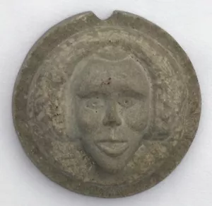 A stone carving of a woman's face, expressive and very well done. - Picture 1 of 5