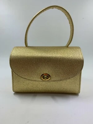 Cartera de noche vintage pequeña estructurada dorada coja años 50 excelente estado  Foto 1 de 4