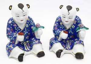 Par de estatuillas orientales vintage de Buda de 6 1/2" para niños asiáticos sosteniendo flores - Imagen 1 de 9