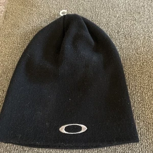 Vintage USA Oakley Beanie schwarz Outdoor Ausrüstung Winter Streetwear Logo Software - Bild 1 von 4