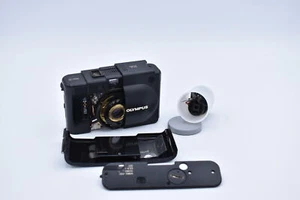 Olympus XA fotocamera pellicola 35 mm, nero * solo per parti di ricambio / riparazione * - Foto 1 di 8